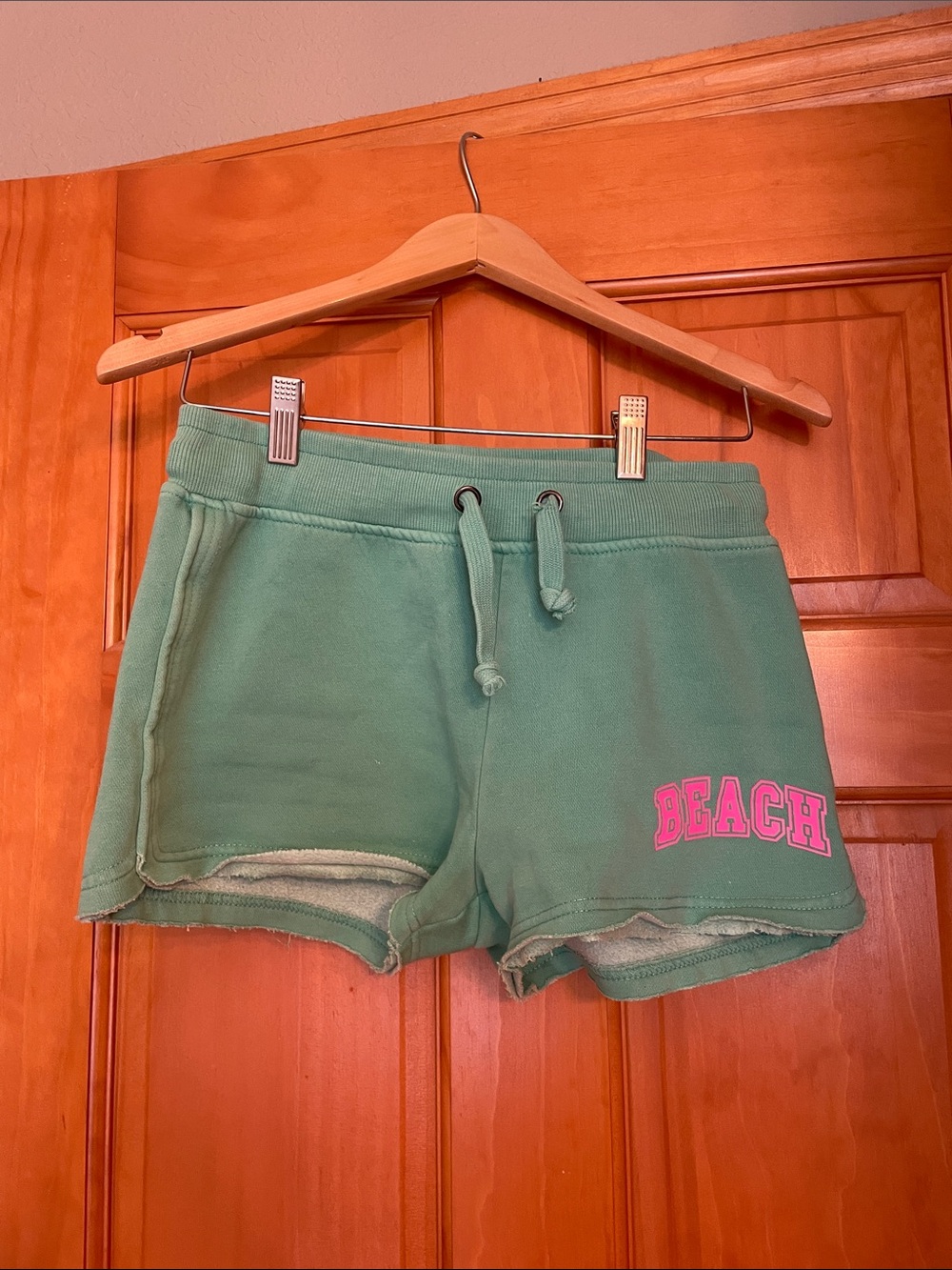 Green Drawstring Athletic Shorts with Pink 'BEACH' Accent